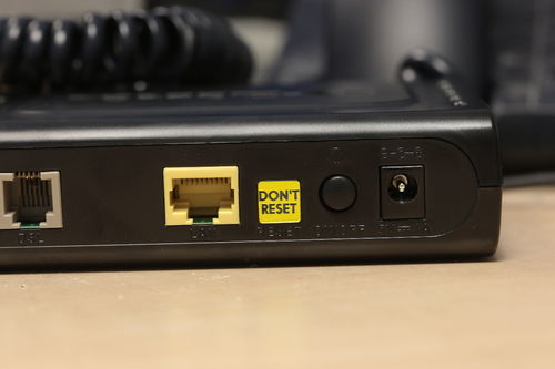 Rear view of obsolete pre-Z1 modem, showing blanked-off reset button